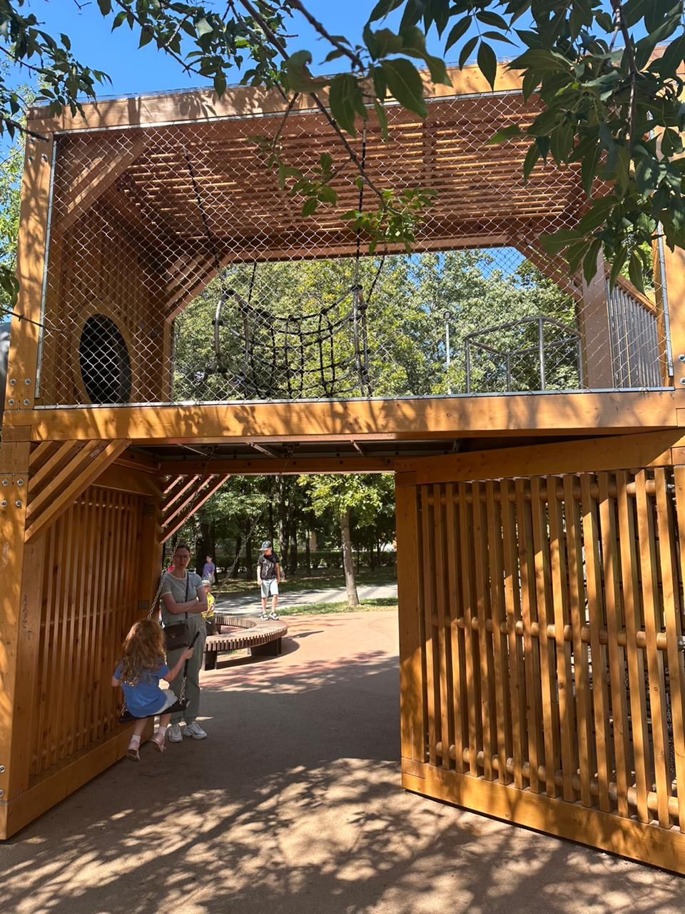 News Article: Natural Wood Double-Tower Playground With Stainless Steel Multi-Function Mesh System