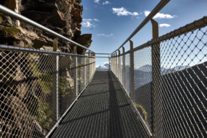 Stainless‑Steel Rope Mesh Railing VS Glass Railing: Pros & Cons For Architecture